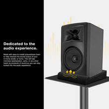 Load image into Gallery viewer, a black speaker on a stand with text: 'Dedicated to the audio experience. Made with easy-to-install polyurethane foam to help improve the sound output of your in-home studio or home. This will help minimize reverberation, echo, or any other by-products of sound so you can stay locked into the audio experience.'