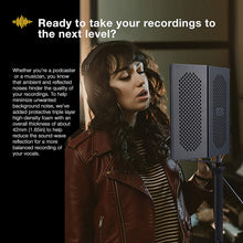 Load image into Gallery viewer, a person singing into a microphone with text: 'Ready to take your recordings to the next level? Whether you're a podcaster or a musician, you know that ambient and reflected noises hinder the quality of your recordings. To help minimize unwanted background noise, we've added protective triple layer high-density foam with an overall thickness of about 42mm (1.65in) to help reduce the sound-wave reflection for a more balanced recording of your vocals.'
