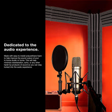 Load image into Gallery viewer, a microphone in a room with text: &#39;Dedicated to the audio experience. Made with easy-to-install polyurethane foam to help improve the sound output of your in-home studio or home. This will help minimize reverberation, echo, or any other harsh by-products of sound so you can stay locked into the audio experience.&#39;
