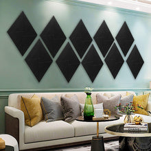 Load image into Gallery viewer, a room with a couch and a coffee table with text: 'CHANEL'