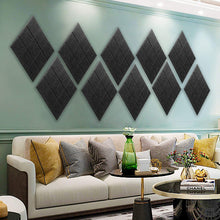 Load image into Gallery viewer, a room with a couch and a coffee table with text: 'CHANEL'