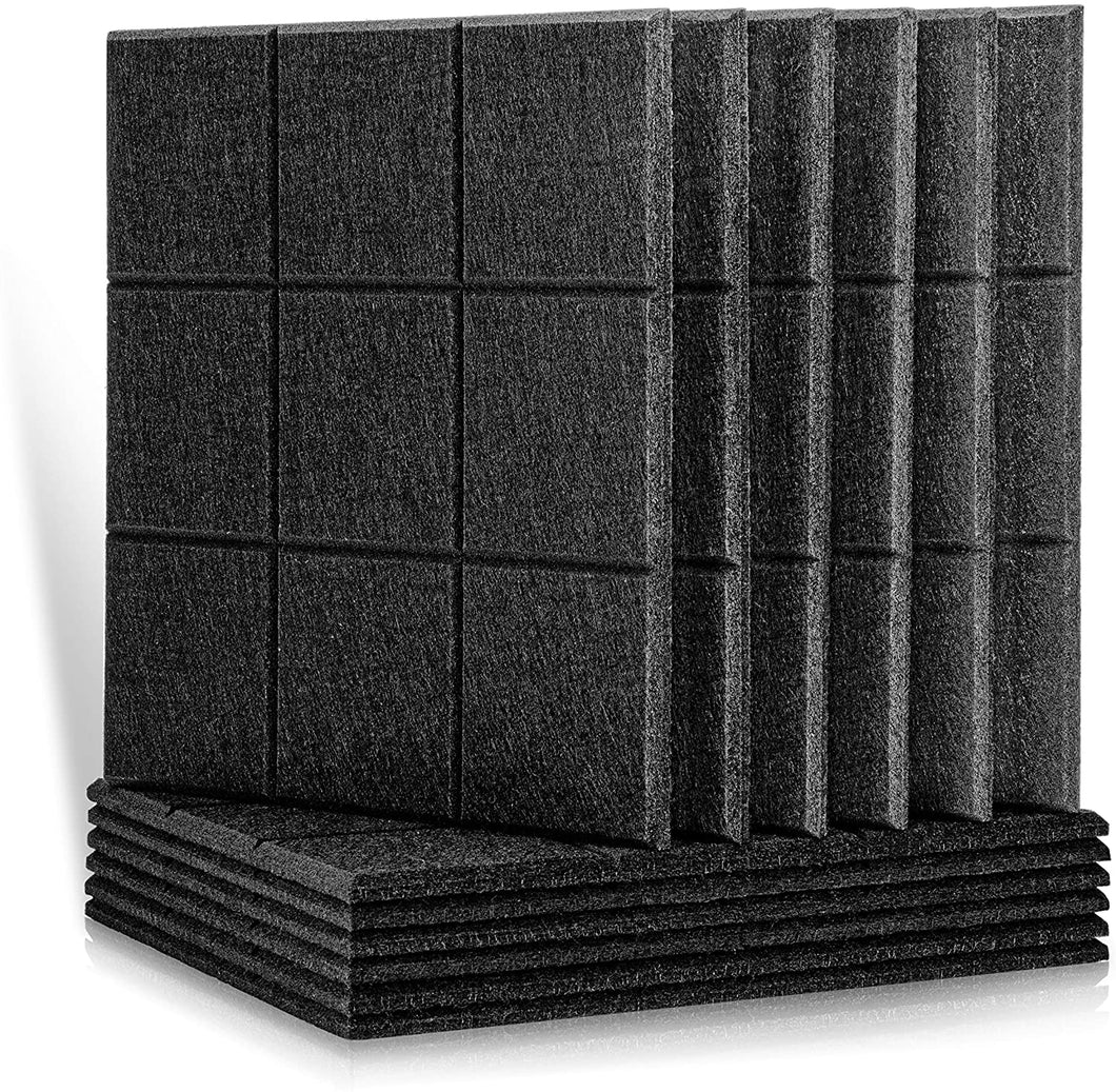 a stack of black square tiles
