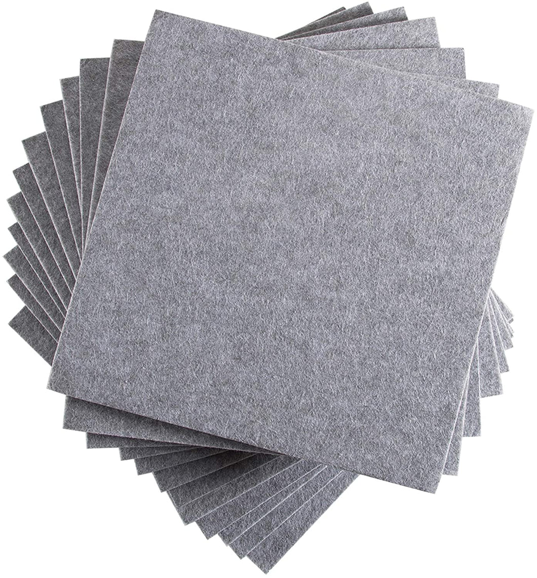 a stack of grey square tiles